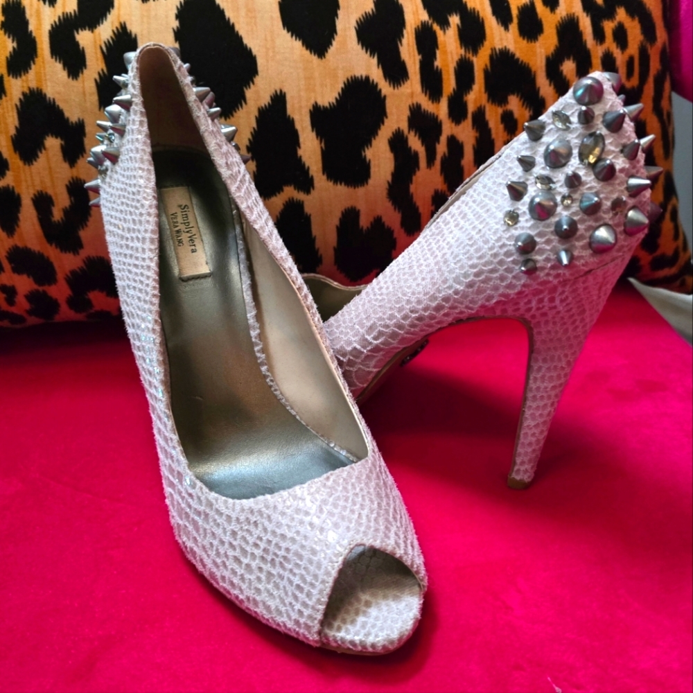 Vera Wang neutral faux snake peep-toe pumps with studs and spikes.